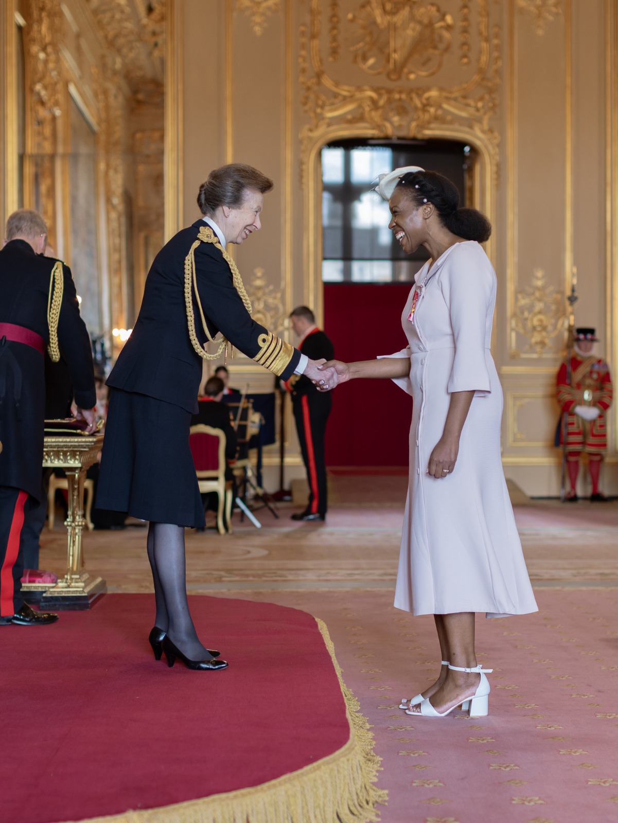 Georgina Wilson OBE receiving her honour from Princess Anne at Windsor Castle